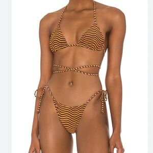 Tropic of C Praia Bikini in Oran